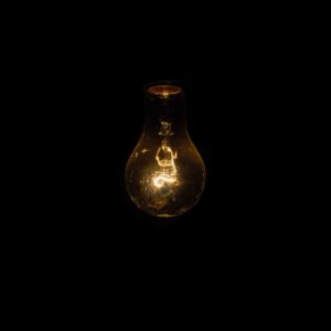 Image of a dimmed light bulb for the When a successful school becomes too successful post