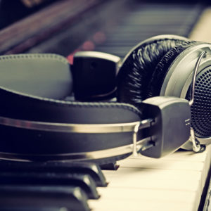 Image of an electronic keyboard and headphones for the School Arts facilities post